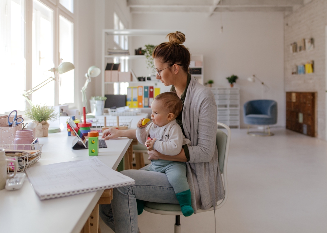 Worker with baby working